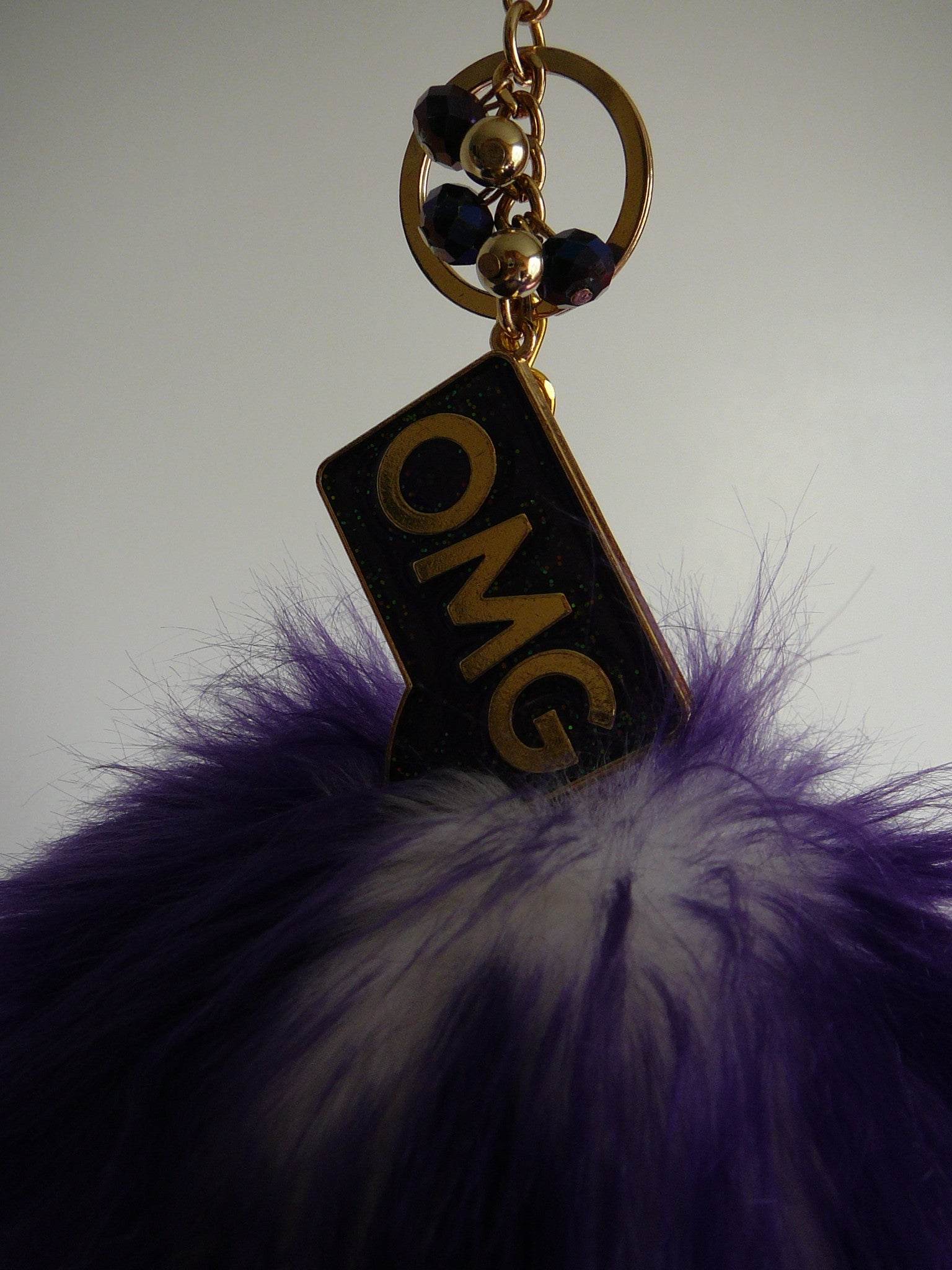 Faux Fur w/Charm Purple